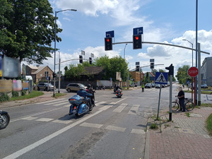 Zabezpieczenie zjazdu motocyklowego przez policjantów WRD