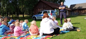 Spotkanie półkolonistów z policjantem